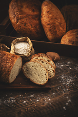 Image showing Whole and sliced breads