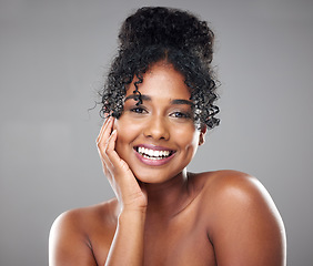 Image showing Beauty, skincare and woman smile for natural skin glow, dermatology and wellness in mockup studio background. Face of a happy, relax and black model excited about facial care, wellness of cosmetics