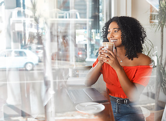 Image showing Coffee shop, thinking and happy black woman in cafe drinking espresso or cappuccino while doing remote work on laptop. Freelance female with drink for motivation, idea and wifi for blog in London