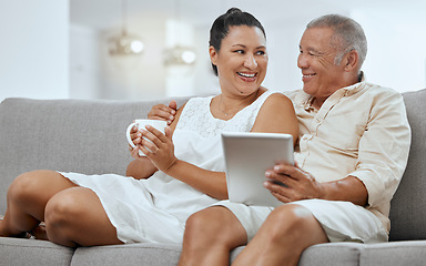 Image showing Love, senior couple and tablet to scroll online, being happy and smile together on living room sofa. Romance, man and woman with digital device for bonding, anniversary and marriage or relax on couch