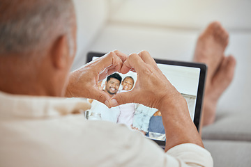 Image showing Laptop, heart hands and video call with family, happy senior man relax on sofa in living room. Love, happy family and communication, a video call on screen and technology to connect people together.