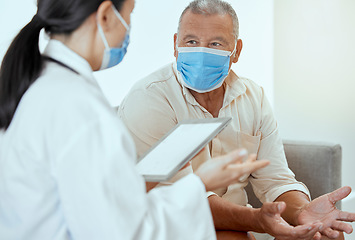 Image showing Covid, senior patient and doctor with tablet, discussion for medical results and appointment in hospital. Mockup, medical professional and man with mask talk, speaking and consultation for healthcare