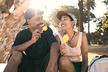 Image showing Happy, ice cream and couple in nature talking while on an adventure, holiday and journey in Mexico. Happiness, smile and young man and woman eating a dessert while on an outdoor date on vacation.