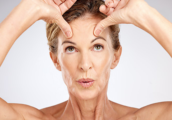 Image showing Senior woman, beauty portrait and face lift on gray studio background. Wellness, skincare model and lady from Canada with spa aesthetic for skin anti aging, cosmetics or healthy facial care treatment.
