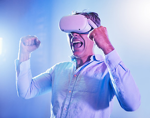 Image showing Winner, senior and man with virtual reality glasses celebrating game win with success fist. Metaverse, ar and vr celebration of online 3D gamer male excited with progress and achievement.