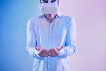 Image showing VR, man and innovation in palm hands, cyber marketing and ai futuristic metaverse on color background. Virtual reality, holding advertising space and digital future, user technology or fantasy vision