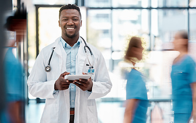 Image showing Black man, doctor and healthcare, hospital and tablet for communication with technology and digital medical information. Health insurance, professional and smile in portrait, stethoscope at clinic.