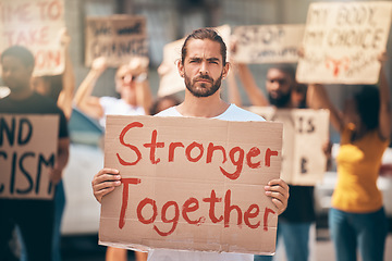 Image showing Portrait, protest in street and group stand in solidarity, climate change and march together. Man, people and crowd support human rights, equality activism and blm movement for lgbtq, racism or earth