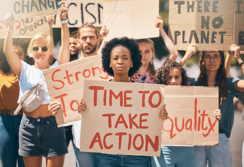 Image showing Group, protest and portrait in street, poster or climate change with march, walking or together for change. People, diversity or action in activism, equality or empowerment for racism, lgbt and earth