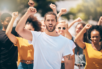 Image showing Diversity, people and protest voice opinion in a city with fist and arms in the air for justice or equality. Crowd of freedom event in streets for power, community and social opinion with motivation