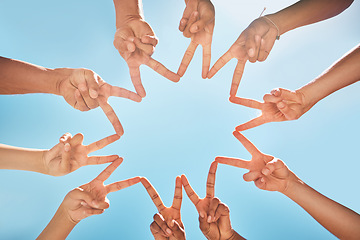 Image showing Group, hands and fingers with star for peace, solidarity and blue sky in sunshine on vacation. Friends, family and fun for community, support and summer for bonding with sign, connected and together