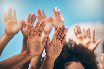 Image showing Pray, hands and people praying against blue sky, united for religion, worship and praise outdoors. Community, church and hand of people in support of God, peace and love by group in spiritual prayer