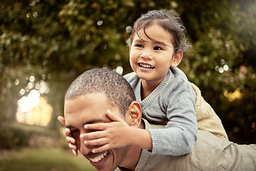 Image showing Dad, child and piggy back with cover, eyes and playing in garden, backyard or park for fun. Family, father and girl with hands on face with smile, happiness and game by trees in summer for bonding