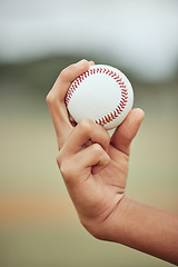 Image showing Baseball, sports and sport exercise of a hand about to pitch and throw in pitch. Fitness man, training and baseball player workout of a athlete in outdoor holding a ball for a game or practice skill