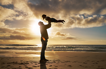 Image showing Beach silhouette, father and child play, bond or enjoy fun quality time together in Rio de Janeiro brazil. Happy family love, sunset flare of freedom peace for dad and youth kid playing on ocean sand