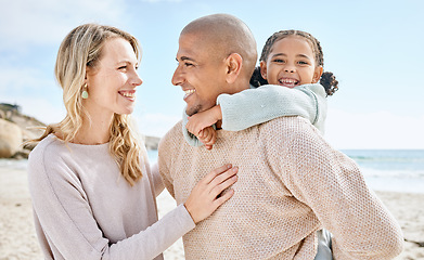 Image showing Family beach, child travel and parents happy on holiday by the tropical water on Island in Costa Rica during summer. Happy mother, father and girl with smile on vacation by a sea or ocean with love