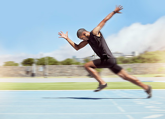 Image showing Fitness, sports and runner running with speed, fast and with determination in training, exercise and cardio workout. Wellness, action and athlete sprinter sprinting in practice on race track in USA