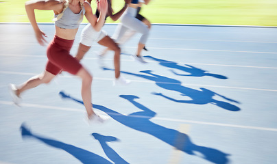 Image showing Sports, race and running on track together with athletes in outdoor stadium. Fitness, exercise and blur of people in racing competition for event. Speed, fast and runners on running track.