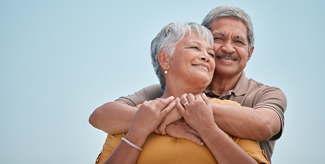 Image showing Love, senior couple and hug being happy together, bonding and embrace for anniversary, marriage and smile. Romantic, elderly man and woman celebrate relationship, for romance or loving for happiness.