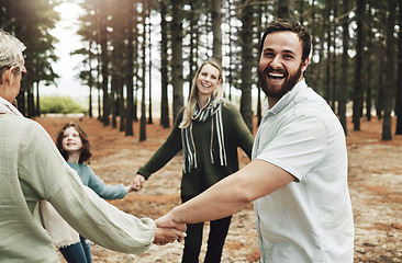 Image showing Happy, mother and father playing in forest enjoying quality bonding time together holding hands in nature. Hand of mom, dad and child with grandparents in fun love, support and family care outdoors