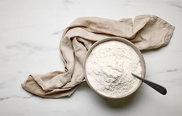 Image showing bowl of flour and linen towel 