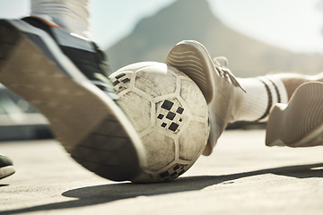 Image showing Soccer ball, feet or tackle motion in fitness game, workout match or exercise competition challenge on Portugal city building rooftop. Zoom, sports men or football player shoes fighting to score goal