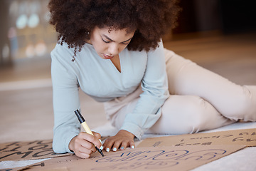 Image showing Black woman, poster and being creative for protest, solidarity with Iran women or prepare for action. African American female, girl and create with cardboard box, draw and for climate change activist