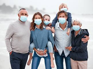 Image showing Covid, family and ocean portrait with children in Germany with corona virus protection mask. Love, care and big family bonding at beach with coronavirus face mask for safety of grandparents.