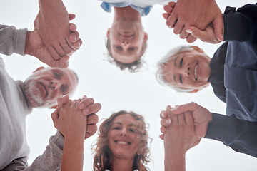 Image showing Family, below and holding hands in circle with smile, love and bonding together outdoor. Mom, dad and grandparents with support, unity and trust for care, happiness and help while happy on vacation