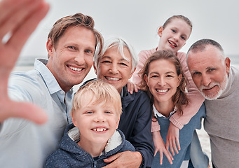 Image showing Selfie, smile and portrait of happy family on the beach for winter fun, bond and enjoy quality time together. Love, nature and big family on Toronto Canada vacation for peace, freedom and wellness