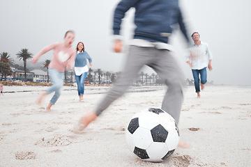 Image showing Beach, soccer and family beach sport on the sand with happy energy and quality time. Football and summer game on the sand with kids and parents having vacation fun by the ocean, sea and nature