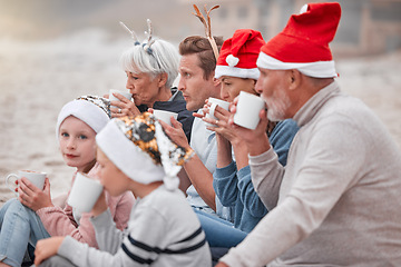 Image showing Big family, drinking cocoa and relaxing for Christmas holiday, bonding and quality time together in the outdoors. Parents, grandparents and children in family celebration for December festive season
