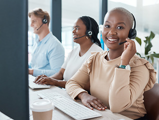 Image showing Call center, customer service and crm with a black woman consultant working with her team in the office. Contact, ecommerce and contact us with a female telemarketing employee at work with colleagues