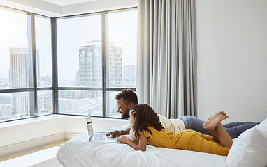 Image showing Video web streaming, computer and father at a hotel with a kid using technology together. Online tv, movie and internet video watching of a dad and young girl on a apartment bedroom bed with a laptop
