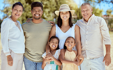 Image showing Nature, summer and portrait of big family in park for fun, bonding and quality time together outdoors. Diverse grandparents, parents and kids on family outing enjoying holiday, vacation and weekend