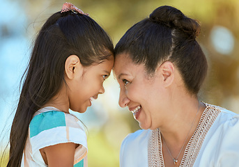 Image showing Asian, grandmother and child with embrace, happy and together in bonding, love or care while outdoor. Senior, woman and girl with face, touch and smile in sunshine, summer or happiness in family