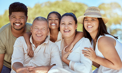 Image showing Big family, parents and children bonding together outdoor in a nature park with a smile. Portrait of grandparents, mama and kids spending quality time with love feeling happiness and youth outdoors