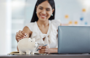 Image showing Woman, money and savings with piggy bank in office, desk and workplace with laptop for finance, investment and future. Cash, planning and financial for bank, happy and retirement at work with pc