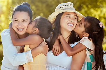 Image showing Women, family and face kids kiss in a nature park with mother and daughter spending quality time together. Portrait of mothers day love and care with a hug from a girl in summer and mama gratitude