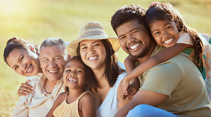 Image showing Happy, big family and garden picnic at the park with parents, grandparents and children bonding in nature outdoors. Love, happiness and a family reunion with elderly people, mother and dad on grass