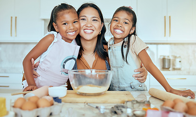 Image showing Baking, mother and children in kitchen, happy and smile together, bonding and child development. Portrait, mama and girls learn skills, loving and child care for fun, joyful and daughter at home.