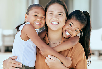 Image showing Happy, portrait and children hugging their mother with a smile, love and care outside their house. Happiness, embrace and girl kids with their mom in Mexico sitting outdoor in their backyard at home.