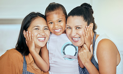 Image showing Family, generations and hug, women with girl and happy together in portrait, mother and daughter with grandmother in family home. Hispanic, people and smile, apron and bonding, spending quality time.