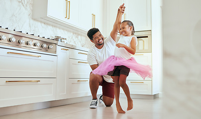 Image showing Dad, girl and ballet dance of a child in a home kitchen dancing together and bonding. Family man, father and kid dancer having fun and spending quality time with care happy from a crazy twirl