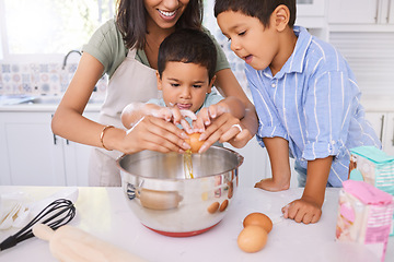 Image showing Baking, mother and children learning about cooking, food and lunch in the kitchen together. Happy, young and mom teaching, helping and making a cake, cookies or dinner with kids in their house