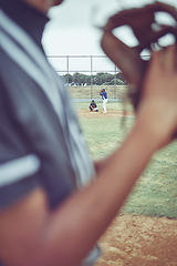 Image showing Baseball, sports and fitness with a batter and pitcher on a grass pitch or field during a game or match. Exercising, training and workout with a baseball player playing in a competitive sport