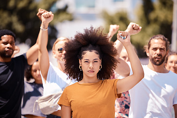 Image showing People protest for freedom, support fist for climate change or black power empowerment in Los Angeles. Young woman, community rally together to fight for future human rights or global revolution