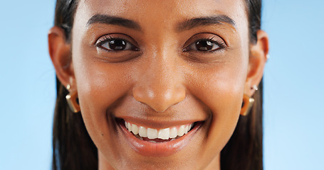 Image showing Teeth whitening, dental portrait and woman with smile for oral care, wellness and mouth on blue background. Beauty, hygiene and orthodontics with skin, cosmetics and healthy in studio with veneers