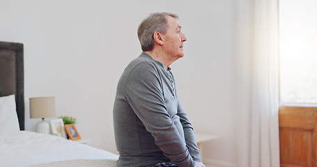 Image showing Lonely, senior man and thinking in bedroom with depression, anxiety or mental health in retirement. Tired, elderly person and remember grief or loss in morning, home or sad in the house with a memory