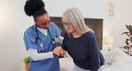 Image showing Walking, support and doctor with senior woman in homecare facility for medical home consultation. Balance, recovery and elderly female with a nurse in bedroom for therapy, help or healthcare advice